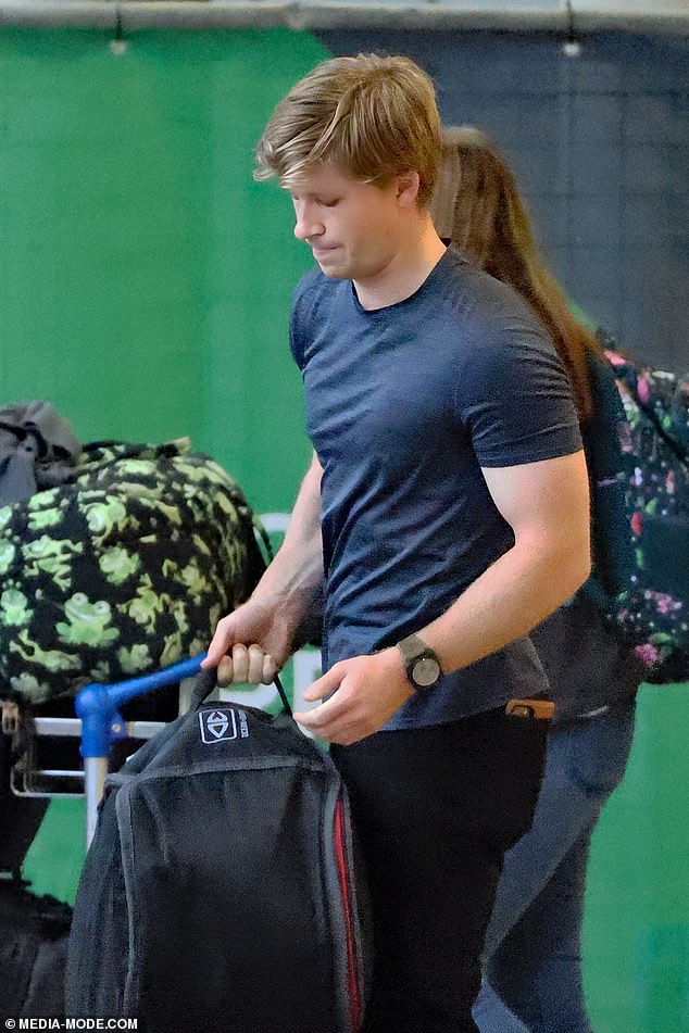 The 20-year-old conservationist was accompanied by his mother, Terri Irwin, when he landed at Brisbane Airport