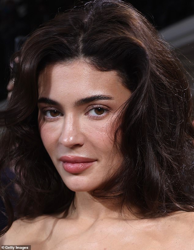 She appeared to be referring to her performance at Paris Fashion Week (seen), when trolls claimed she looked 'old' and slammed her for using too much filler