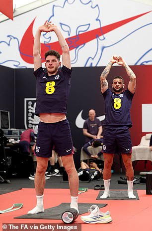 Declan Rice (left) and Kyle Walker (right) take part in the yoga session
