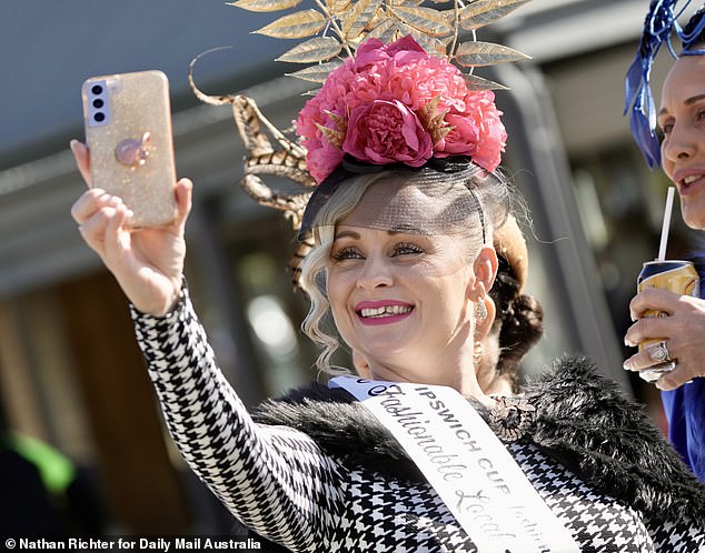 A happy visitor takes a selfie as the event kicks off on Saturday