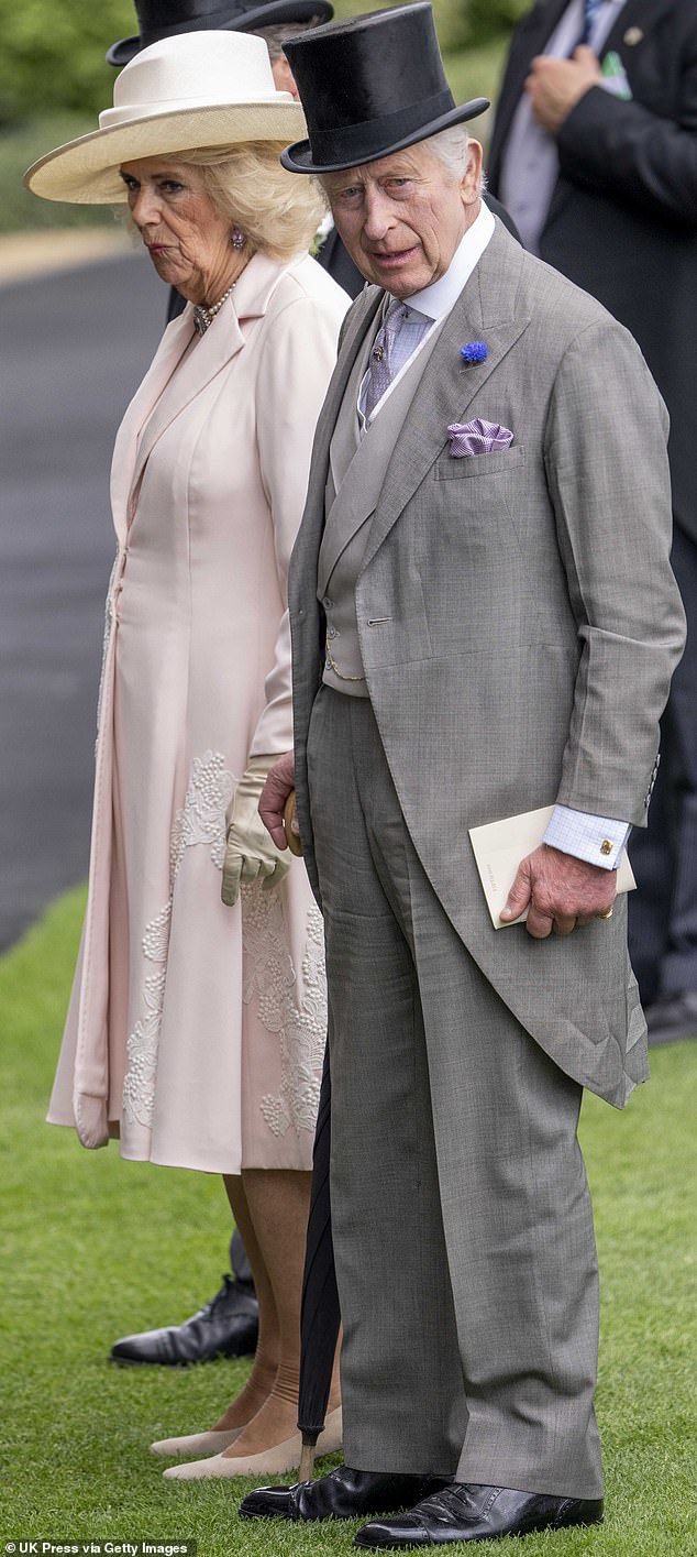 BRAVE: The King and Queen look stylish as they attend the final day of Royal Ascot in Berkshire today