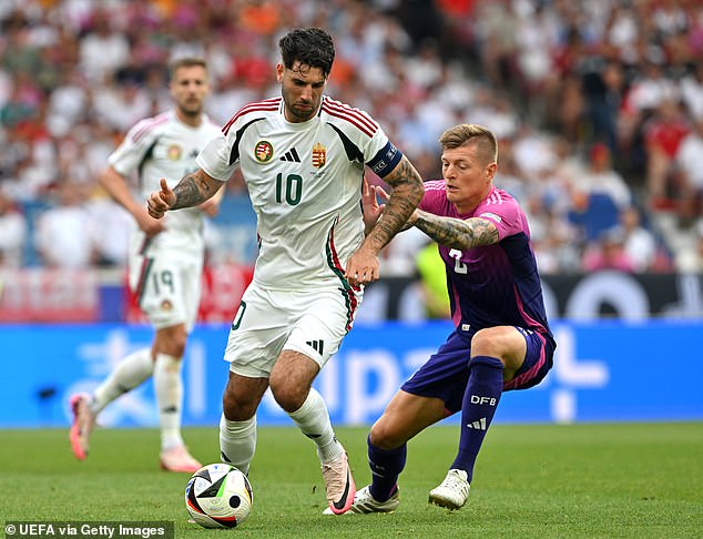 Szoboszlai is closely watched by German star Toni Kroos in the German's 2-0 against Hungary