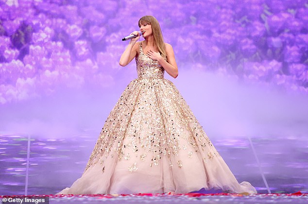 Swift, 34, wore a ball gown last night as she sang her hit Enchanted at Wembley Stadium