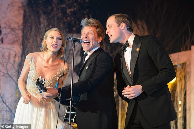 Taylor Swift, Jon Bon Jovi and Prince William sing Livin' On A Prayer on stage at the Centrepoint Gala Dinner at Kensington Palace in London on November 26, 2013 - after the royal family 'like a puppy' obeyed her suggestion that they join her add