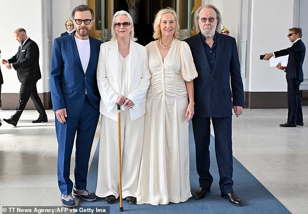 ABBA, Bjorn Ulvaeus, Anni-Frid Lyngstad, Agnetha Faltskog and Benny Andersson pose for a photo after receiving the Royal Vasa Order from the Swedish King and Queen during a ceremony at the Royal Palace of Stockholm on May 31, 2024
