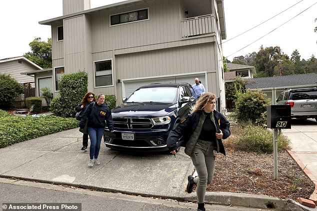 FBI agents leave a home linked to Oakland Mayor Sheng Thao