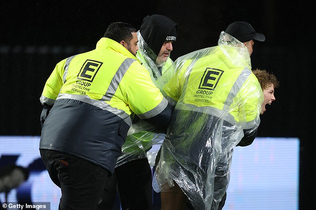 The pitch invader was removed from the pitch by Industree Group Stadium security