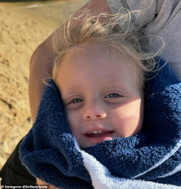 In another photo, the Mahomes' youngest child was adorably wrapped in a blue blanket