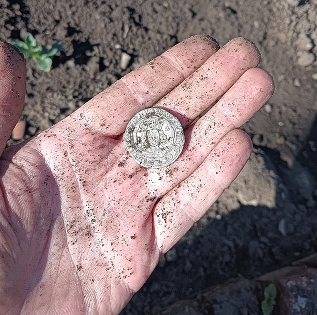 Even covered in dirt, it was clear that this silver coin was worth further investigation