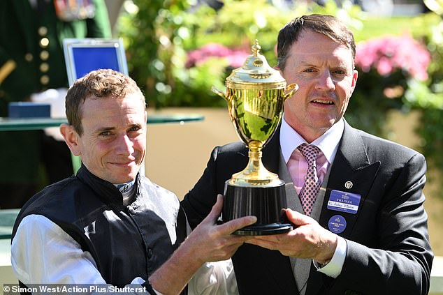 Jockey Ryan Moore and trainer Aidan O'Brien with the Gold Cup after a great week at Ascot