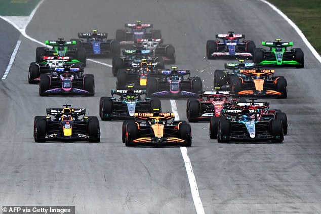 George Russell (right) went from fourth to first in the first corner, but the Mercedes driver eventually fell back to fourth towards the end of the race