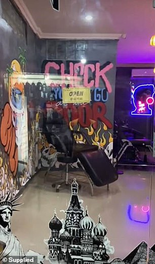 According to tattoo studio staff, the men smashed a glass refrigerator with a chair