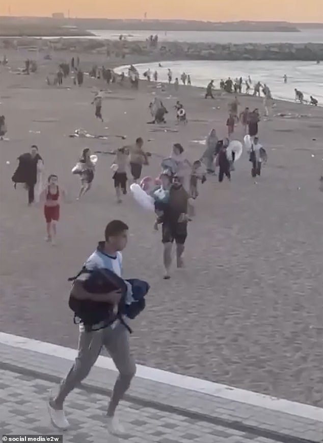 Citizens flee the scene of the shooting