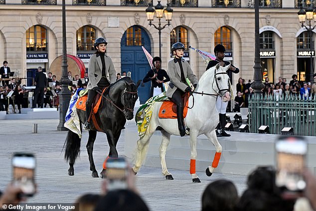 Their horses, Django and Napo, were dressed from mane to hooves in Hermes, while wearing orange, leg warmers and saddles.