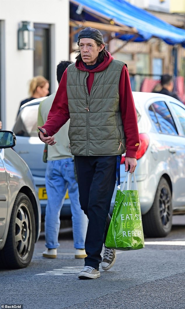 Pierce Brosnan's estranged son Christopher, 51, was seen bundled up while shopping in London's Notting Hill on Friday