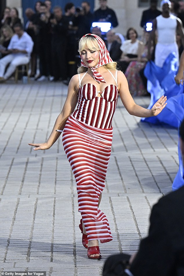 The Expresso singer turned heads as she walked the iconic Place Vendôme in a retro ensemble