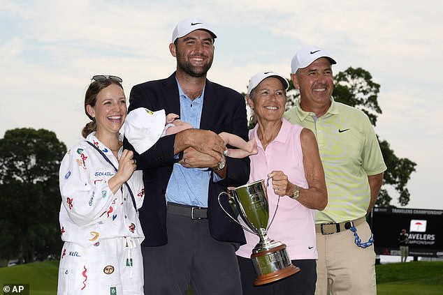 The two-time major winner is pictured with Meredith and his parents Diane and Scott