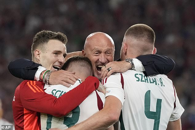The Hungarian stars celebrated emphatically as their stoppage-time goal secured a 1-0 win