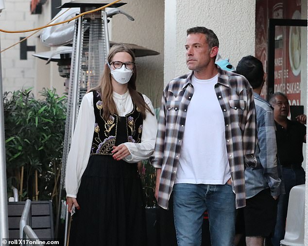 The 51-year-old Oscar winner looked casual in a plaid shirt and jeans as he enjoyed a lunch date with his daughter Violet, 18, in Los Angeles