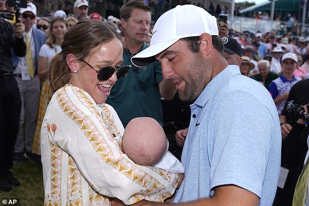 The world number 1 welcomed his first child, Bennett, with his wife Meredith (left) last month.