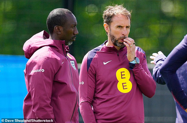 Despite Kane coming under fire for his performance against Denmark, Gareth Southgate (right) retains confidence in the England captain ahead of Tuesday's match against Slovenia