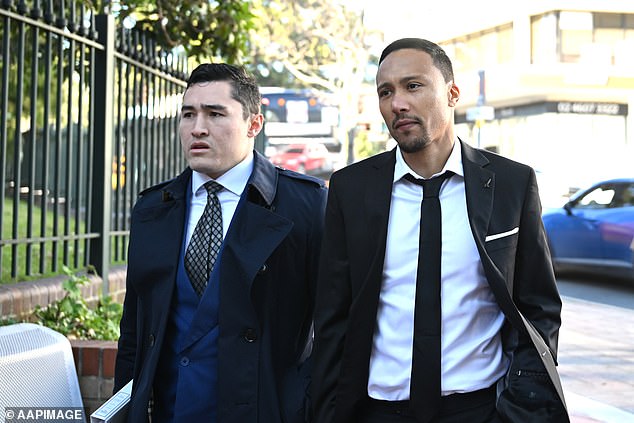 Macarthur FC star Kearyn Baccus (right) is pictured outside a Sydney court after being accused of involvement in the alleged scheme