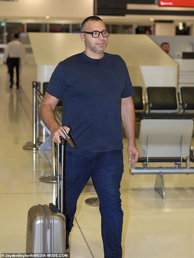 Thorpe dressed casually for the flight, opting for a plain navy blue T-shirt paired with matching trousers