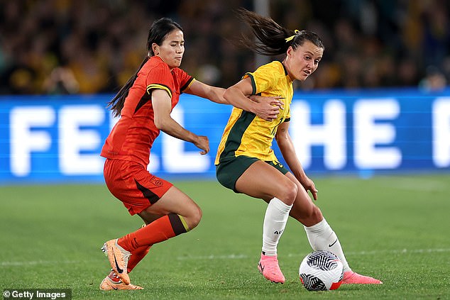 The Queenslander (pictured right playing against China) will be one of Australia's key players at the Paris Olympics next month