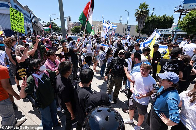 Anti-Israel protesters gathered at the synagogue on the 9000 block of West Pico Boulevard to prevent people from entering the temple