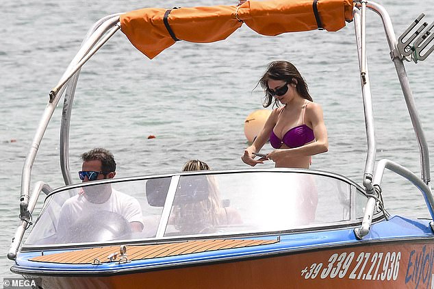 Leni was pictured wearing black sunglasses while riding the boat