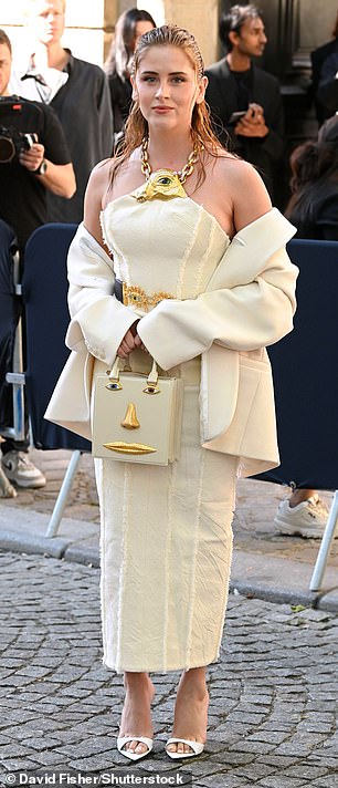 Italian model Valentina Ferragni cut an elegant figure in a white strapless dress which she paired with a matching jacket