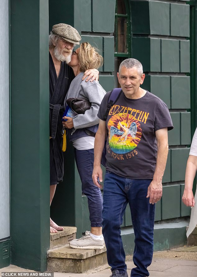 The friend outside Sir Ian McKellen's London home yesterday after his accident