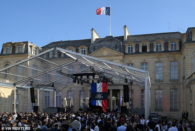 During the annual meeting, visitors gather next to the stage "Festival of music" one-day music festival in the courtyard of the Elysee Presidential Palace in Paris, France, on June 21, 2024