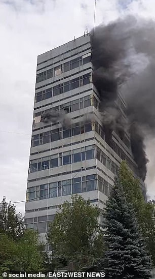 Smoke flows from the high-rise building
