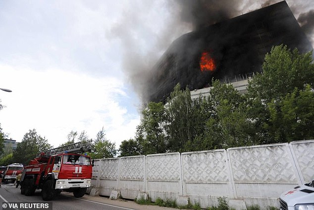 Fire and smoke rise from a burning administrative building in Fryazino, Moscow region