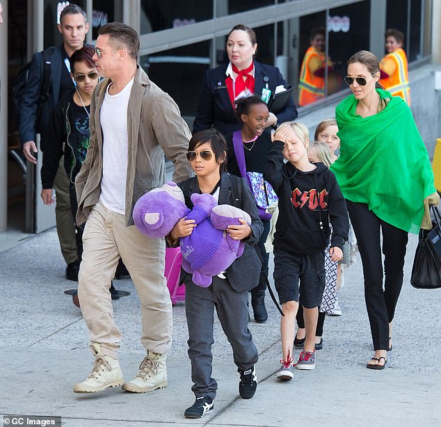 Jolie, who has six children — Maddox, 22, Pax, 19, Zahara, 18, Shiloh, 17, and twins Knox and Vivienne, 1 — with Pitt, reportedly contacted Voight in 2010; (pictured in 2014)