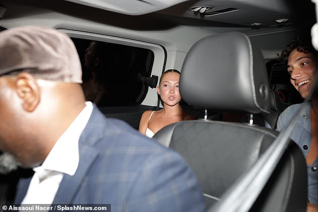 Lila was seen in the back of the car as they prepared to leave the party