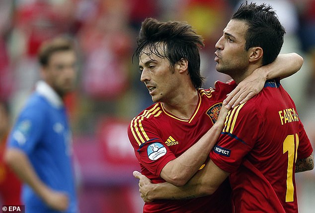 The 37-year-old was deployed in a more advanced role for Spain during their victorious Euro 2012 campaign, with teammate David Silva (left) also playing out of position in the tournament