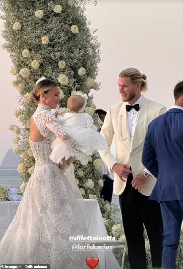 The couple was joined at the altar by their daughter Aria, who was dressed in a cute white dress and bow