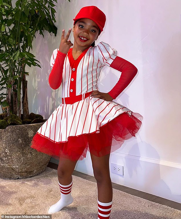 The little girls wore two costumes for their two classes: pink ensembles with tutus and red and white striped baseball-themed outfits with matching caps