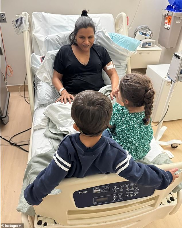 The post also included an image of Mindy sitting in the hospital bed surrounded by her two children