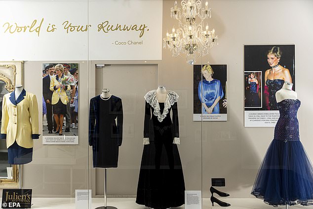 Pictured: A showing of Princess Diana's dress collection in Ireland on June 4 before the items are auctioned