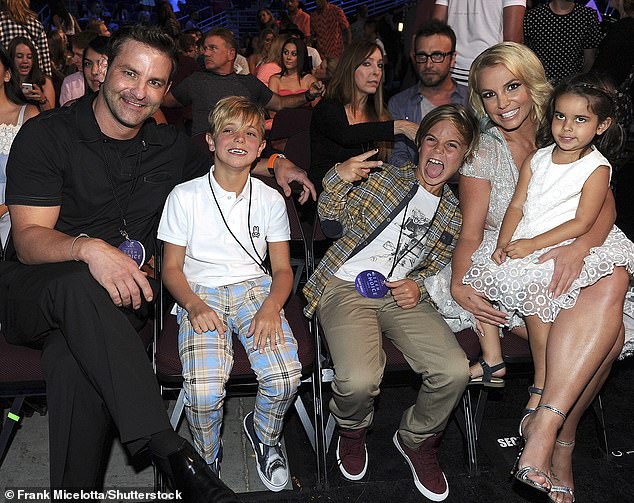 Bryan pictured with Jayden, Sean, Britney and his daughter Lexie at the 2015 Teen Choice Awards