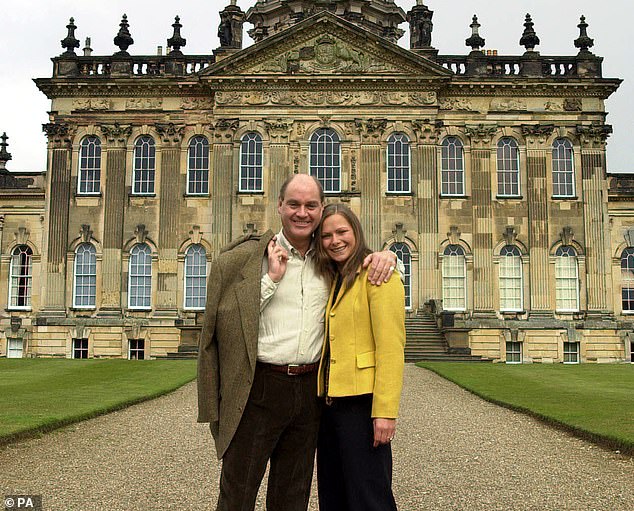Simon Howard and his wife Rebecca pictured outside their former country home Castle Howard in North Yorkshire, which they left in 2015