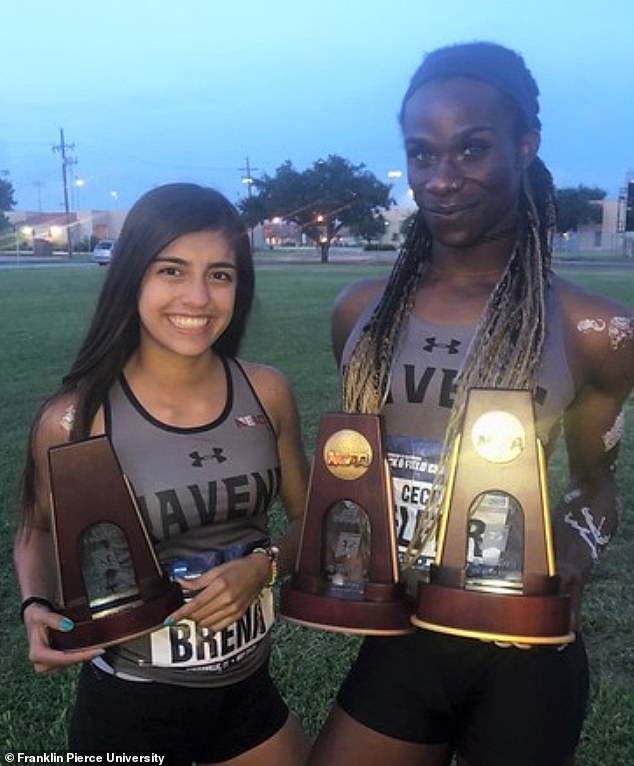 Telfer (right) pictured after winning a Division II national title in the 400-meter hurdles as a senior at Franklin Pierce University in 2019