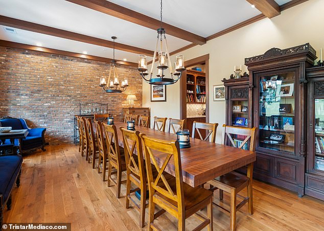 The more traditionally decorated upper floors feature oak floors and exposed brick walls