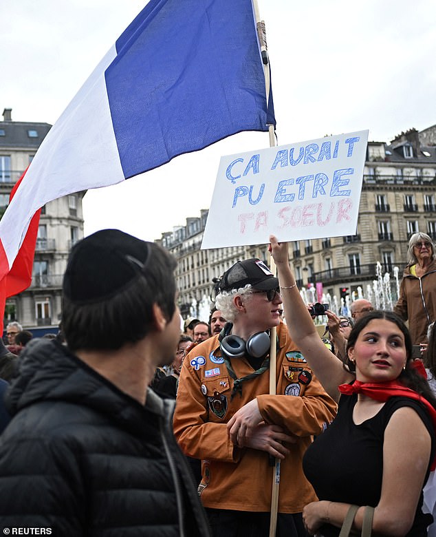 People attend a demonstration against anti-Semitism in front of Paris City Hall after three teenagers aged 12 to 13 were charged in Courbevoie, accused of rape and anti-Semitic violence against a 12-year-old girl, in Paris on June 19.  : 'It could have been your sister'