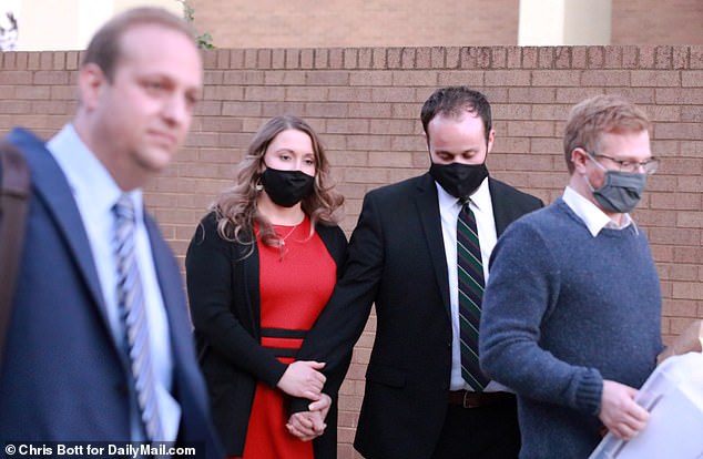 Duggar held hands with wife Anna as he left the courthouse in Fayetteville, Arkansas in 2021