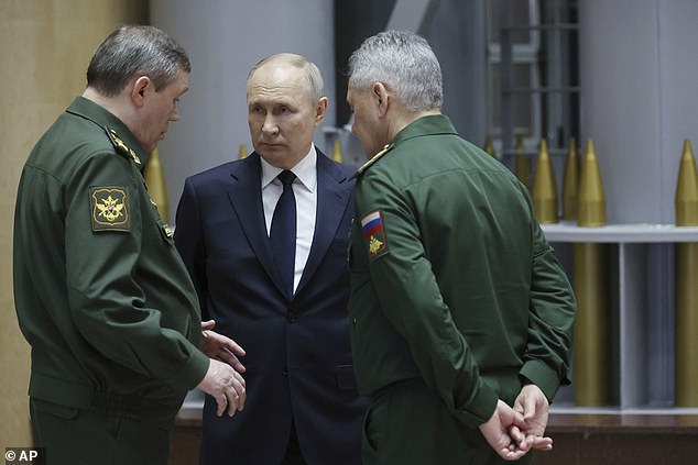 The International Criminal Court has issued arrest warrants for Russian Chief of General Staff Valery Gerasimov and former Defense Minister Sergei Shoigu (pictured with Vladimir Putin)