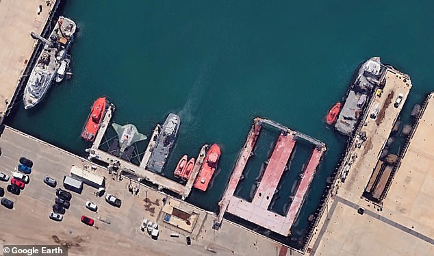 The ship is docked at Port Hueneme Naval Base in California